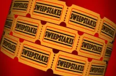 An illustration of yellow sweepstakes lottery tickets on a red background